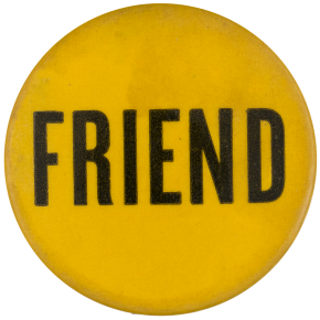 A yellow pinback button with black text reading: Friend.